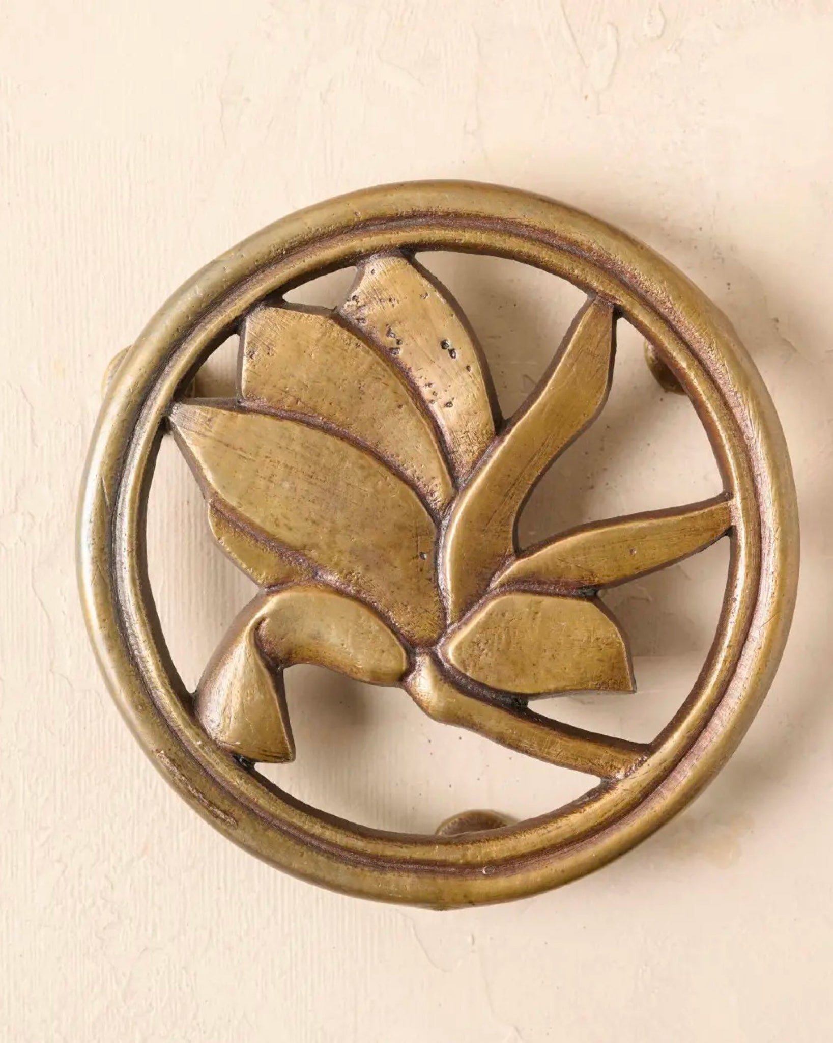 Magnolia Antique Brass Effect Metal Trivet
